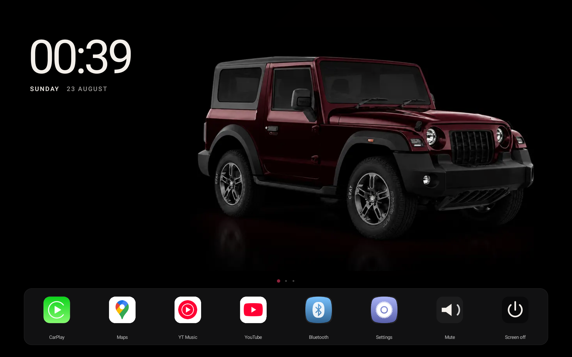 Atelier car dashboard with a burgundy Thar, clock, and app dock